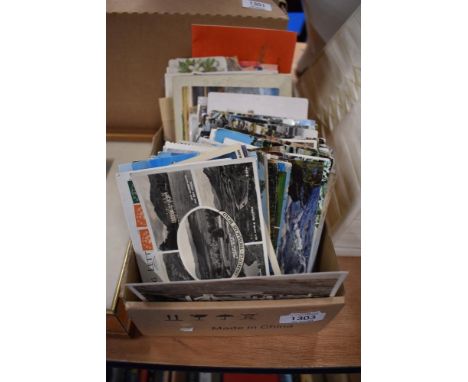A selection of vintage postcards including black and with photographic.