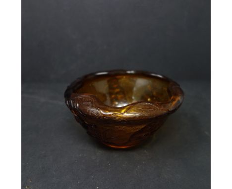 A Chinese Peking glass bowl, decorated with figures and birds with stylised waves to background, seal mark to base, H.6.5cm D