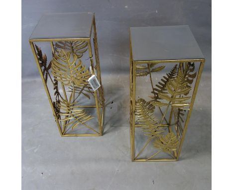 A pair of contemporary gilt lamp tables of leaf design, with bevelled mirrored tops, H.70 W.26.5 D.26.5cm 