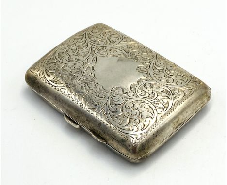 A silver cigarette case with foliate engraved decoration to the front and back, Birmingham 1924, 72.8g. Estimate: £40-60