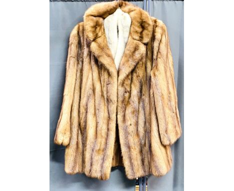 Ladies fur coat and scarf by Charles Moss Furs. Estimate £30-50.