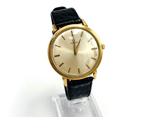 1960's Omega dress watch in yellow metal case, with later black leather strap, not going. Estimate: £100-150