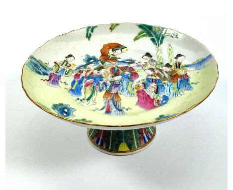 A 19th century Chinese porcelain stem dish with enamelled decoration of young children playing musical instruments, painted b