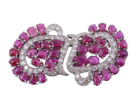 A ruby and diamond double clip brooch, circa 1950   A ruby and diamond double clip brooch,   circa 1950, each clip with scrol