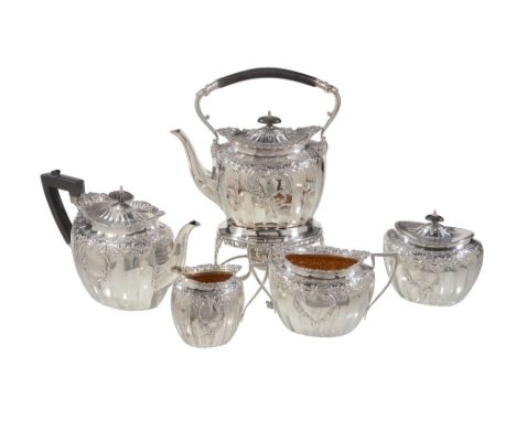 A late Victorian silver five piece oval tea service by James Dixon  &  Son   A late Victorian silver five piece oval tea serv
