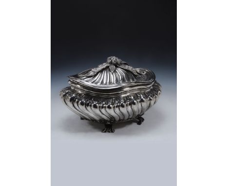 A large Italian silver coloured shaped oval tureen and cover by Buccellati,   A large Italian silver coloured shaped oval tur