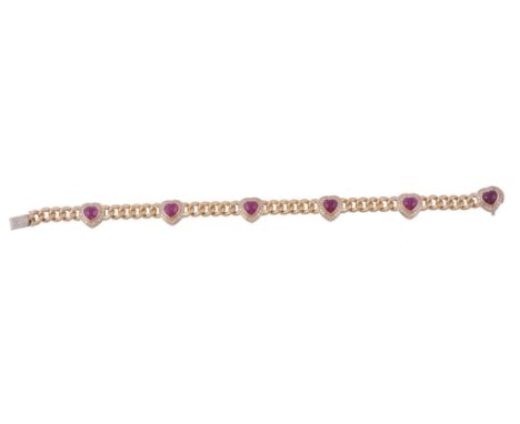 A ruby and diamond heart bracelet, the heart shaped rubies collet set within...   A ruby and diamond heart bracelet,   the he
