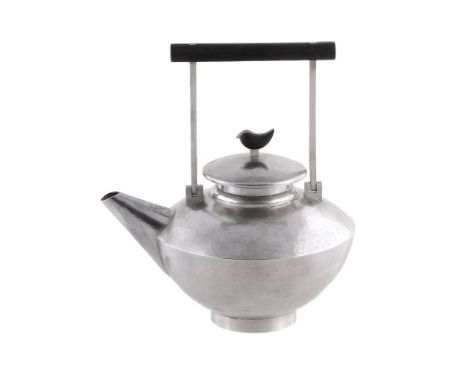 A Scottish hammered silver circular tea pot by Graham Leishman Stewart   A Scottish hammered silver circular tea pot by Graha
