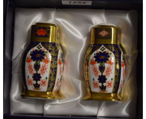 A Royal Crown Derby 1128 pattern two piece cruet set, first quality, boxed