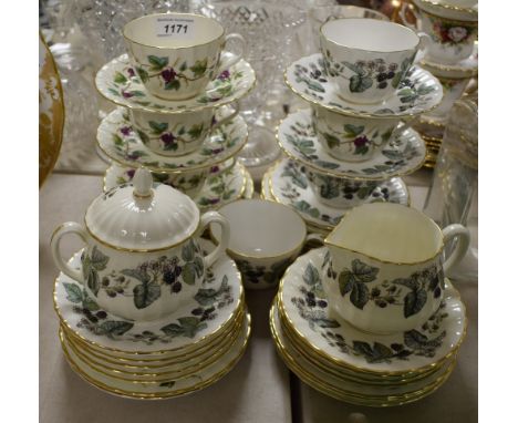 A Royal Worcester tea service, Lavinia and Bacchanal pattern, comprising cups, saucers, side plates, sucrier, cream jug, 23 p