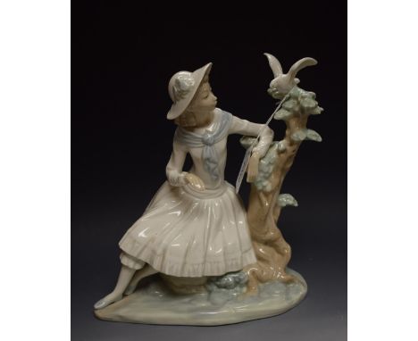 A Nao Spanish porcelain figure, Playing With Doves, Daisa, dated 1980