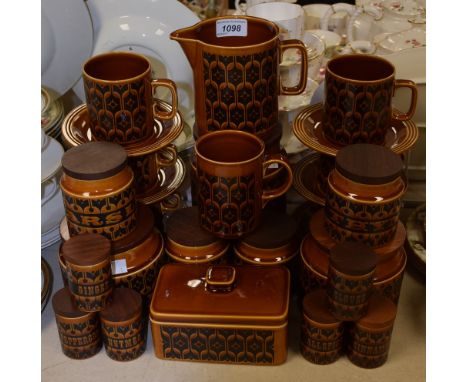 A set of Hornsea Pottery Heirloom pattern storage jars, cups and saucers, spice jars, butter dish, quantity