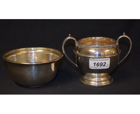 A George VI silver twin handled footed sucrier, Birmingham 1938, sponsor's mark Richard Woodman Burbridge (Harrods); a George