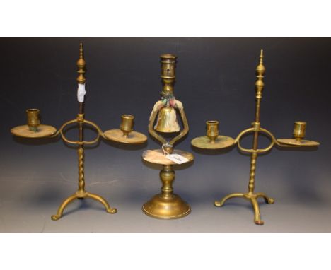 A pair of late 19th Century brass height adjustable two brance table candlesticks, shaped sconces, circular drip pans, tripod