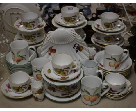 Royal Worcester Evesham Vale - twelve cups and saucers; ten side plates; eight mugs; five soup plates; six desert dishes; thr