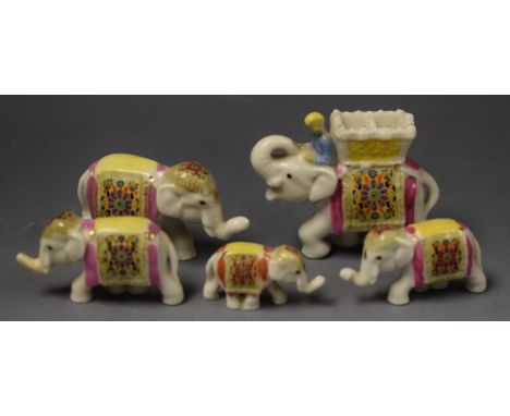 Wade Whimsies - a Wade elephant procession, comprising five graduated miniature models, the first with rider and howdah, prin