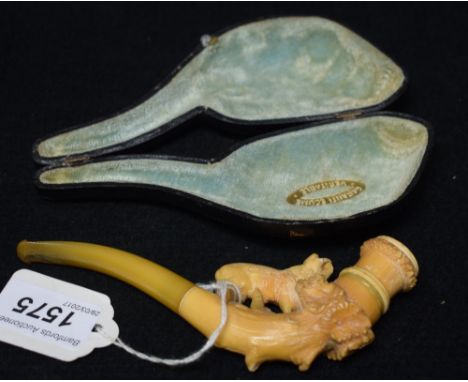 A 19th century Meerschaum pipe, carved with a ram on a rocky outcrop, 15cm long, cased, c.1880