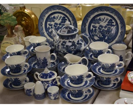 Churchill Blue and White Willows Pattern - twelve cups and saucers; ten side plates; ten bowls; twelve dinner plates; sugar b