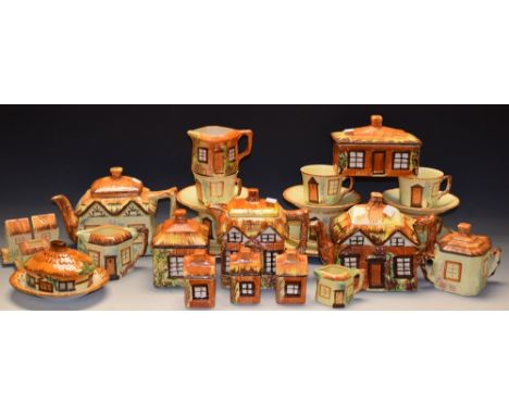 A Keele Street Pottery cottage ware tea set for six comprising cups and saucers, side plates, teapot, cream jugs and sugar bo