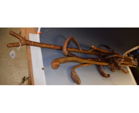 A silver mounted walking stick, Birmingham 1916; others similar (15)