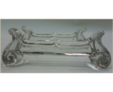 A large collection of Victorian and early 20th century glass knife rests, four pairs in coloured glass, twenty two pairs in c