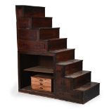 A JAPANESE STAINED ELM STEP TANSU, SECOND HALF 19TH CENTURY