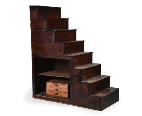 A JAPANESE STAINED ELM STEP TANSU SECOND HALF 19TH CENTURY 212cm high, 181cm wide, 84cm deep    Condition Report:  PLEASE NOT
