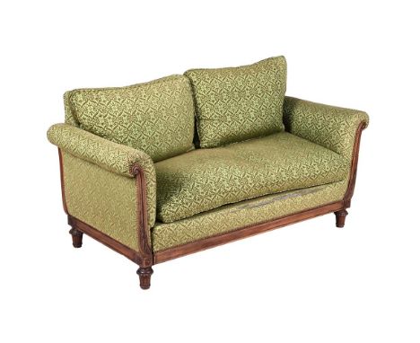 A MAHOGANY AND UPHOLSTERED METAMORPHIC SOFA IN REGENCY STYLE, LATE 19TH OR EARLY 20TH CENTURY One end extending on a telescop