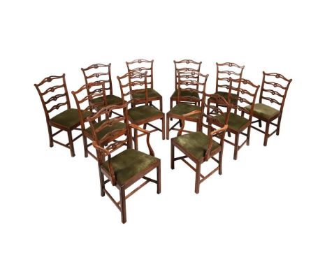 A SET OF TWELVE MAHOGANY LADDERBACK DINING CHAIRS IN GEORGE III STYLE, 20TH CENTURY To include a pair of armchairs the armcha