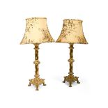 A PAIR OF POLISHED BRASS LAMPS IN CELTIC REVIVAL STYLE, 20TH CENTURY