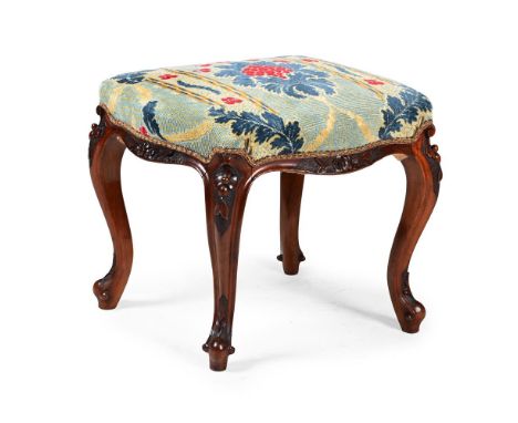 A VICTORIAN WALNUT AND TAPESTRY UPHOLSTERED STOOL CIRCA 1860  The cabriole legs with carved knees  46cm high, 54cm wide, 47cm