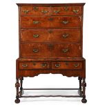 A WALNUT CHEST ON STAND, CIRCA 1740 AND LATER