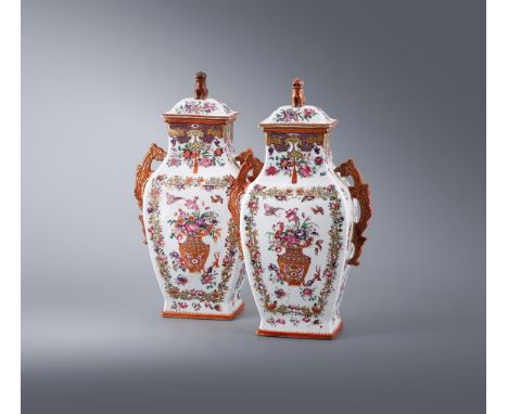 AN ATTRACTIVE PAIR OF CHINESE EXPORT VASES AND COVERS QIANLONG Of rectangular section, painted in colourful enamels with vase