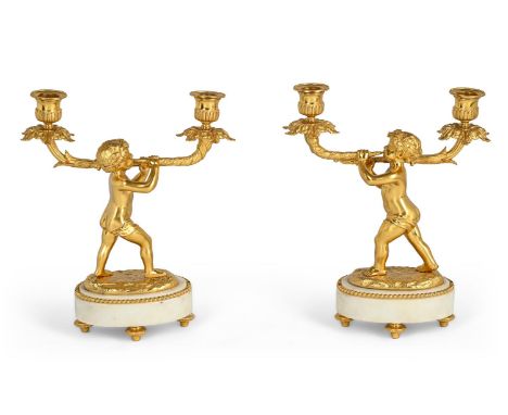 A PAIR OF ORMOLU AND MARBLE TWO LIGHT CANDELABRA IN LOUIS XVI STYLE, NAPOLEAN III PERIOD, CIRCA 1870 each 28cm high    Condit
