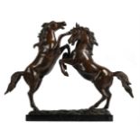 AFTER COUSTOU, AN ANIMALIER BRONZE OF REARING HORSES, 20TH CENTURY