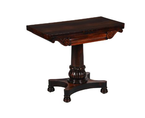 Y  A WILLIAM IV ROSEWOOD CARD TABLE  IN THE MANNER OF DESIGNS BY THOMAS KING, CIRCA 1835 The hinged rectangular top enclosing