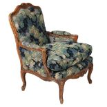 A BEECH AND VERDURE TAPESTRY UPHOLSTERED FAUTEUIL, IN LOUIS XV STYLE, 20TH CENTURY