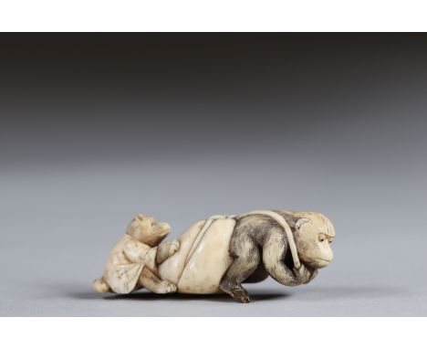 Netsuke carved - a monkey pulling a bag and a teddy bear. Japan Meiji period around 1900Region: JAPANSizes: H=20mm L=55mmWeig