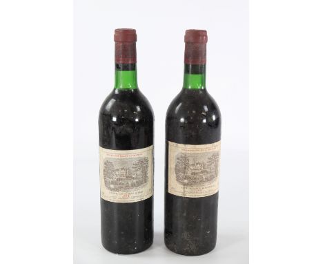2 Bottles Bordeaux Pauillac Chateau Lafite Rothschild 1er-Grand-Cru Classe Red - 1974Sizes: 75clWeight (K): 2kgCondition: (co
