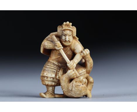 Netsuke / Okimono carved - a samurai fighting a tiger. Japan Meiji period late 19thRegion: JAPANSizes: H=52mm L=35mmWeight (K