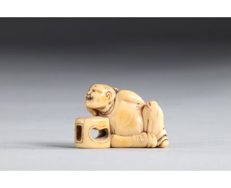 Netsuke carved - a figure leaning on a stool. Japan, Edo periodRegion: JAPANSizes: H=30mm L=40mmWeight (K): 0,015kgCondition: