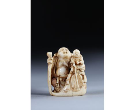 Netsuke carved - a Buddha holding a child. Japan Meiji period around 1900Region: JAPANSizes: H=45mm L=40mmWeight (K): 0,045kg