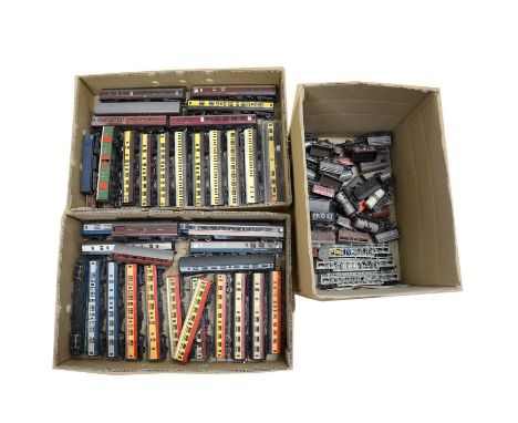 Seventy-two OO gauge model railway passenger coaches and freight wagons, including Mainline, Hornby, Grafar, and others.Qty: 
