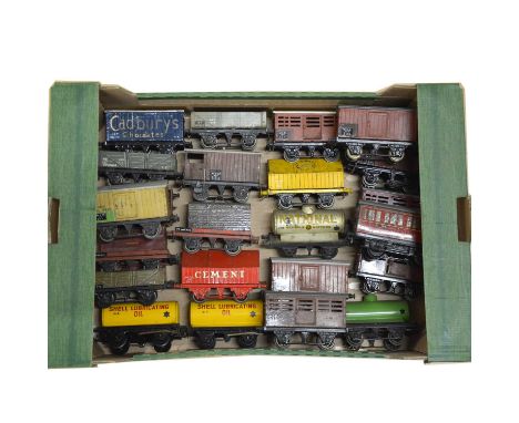 Hornby O gauge model railway freight cars, twenty-three including Shell oil tank (x2); Cement wagon; 7-plank coal wagon; and 