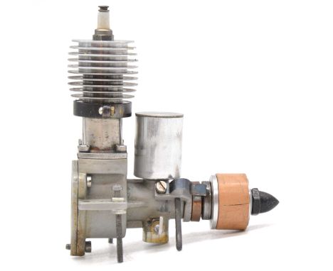 Three Richard Gron sparkie conversion aero model aircraft engines, including Zvezda K-16/4 4.4cc engine; ETA 7cc engine; Kome