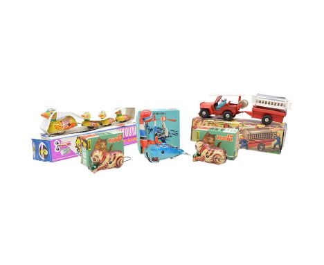 Five tinplate models, including clockwork Jeep fire engine, with key; Japanese clockwork seal; Da Gun Maon Japanese clockwork