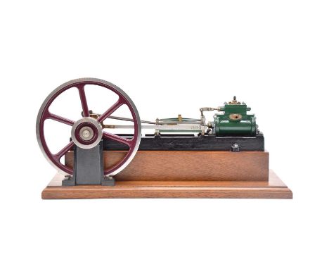 A well engineered model of a Stuart Victoria single live steam engine, length 40cm, 18cm diameter flywheel, finished in green