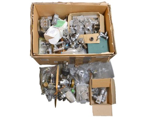 A box of model aircraft engine parts and near-complete enginesQty: 1 box
