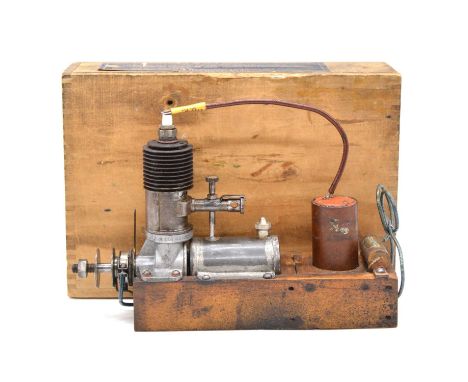 Brown Junior 'Model B' spark ignition aero model aircraft engine, mounted on original wooden frame with original wooden box