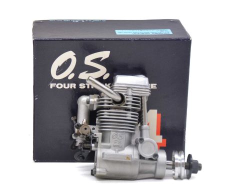 An O.S. FS-26 four-stroke diesel aero model aircraft engine, boxed